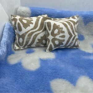 Decorative Brown and White Patterned Throw Pillows